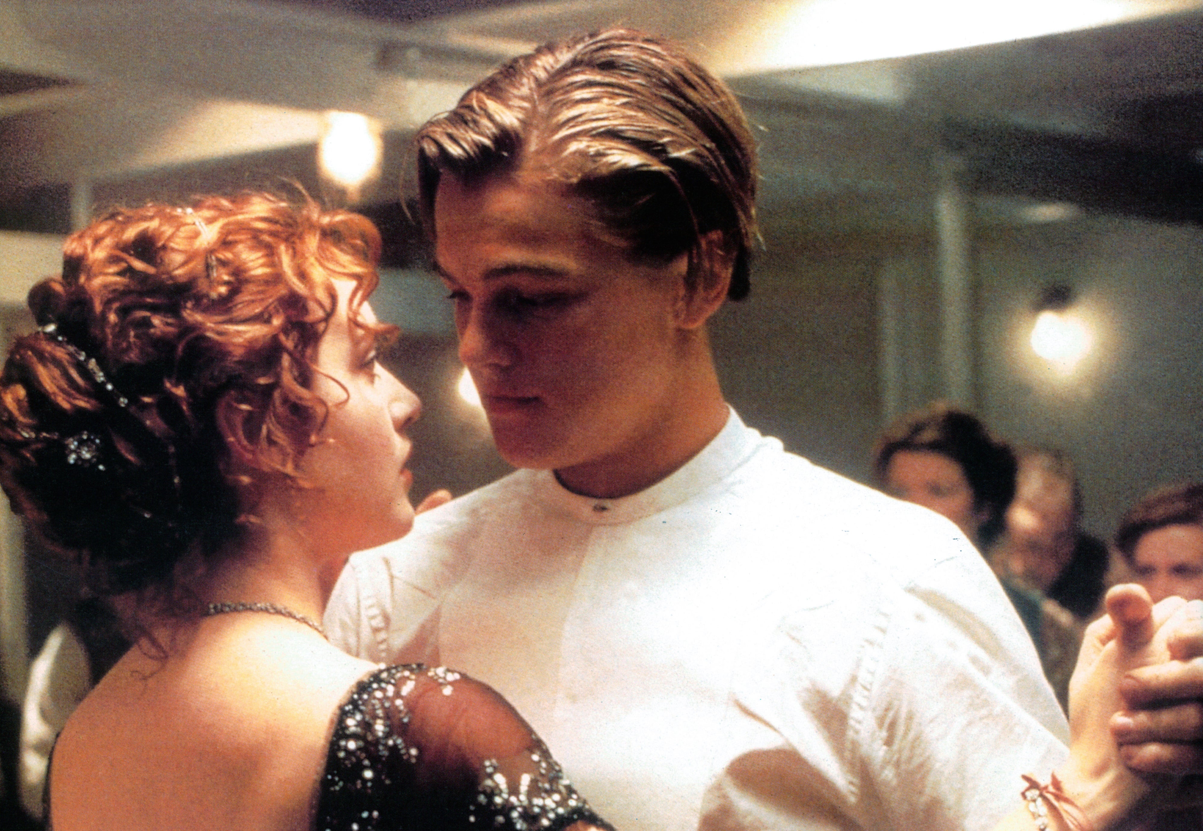 Leonardo DiCaprio and Kate Winslet in a ballroom scene from "Titanic"