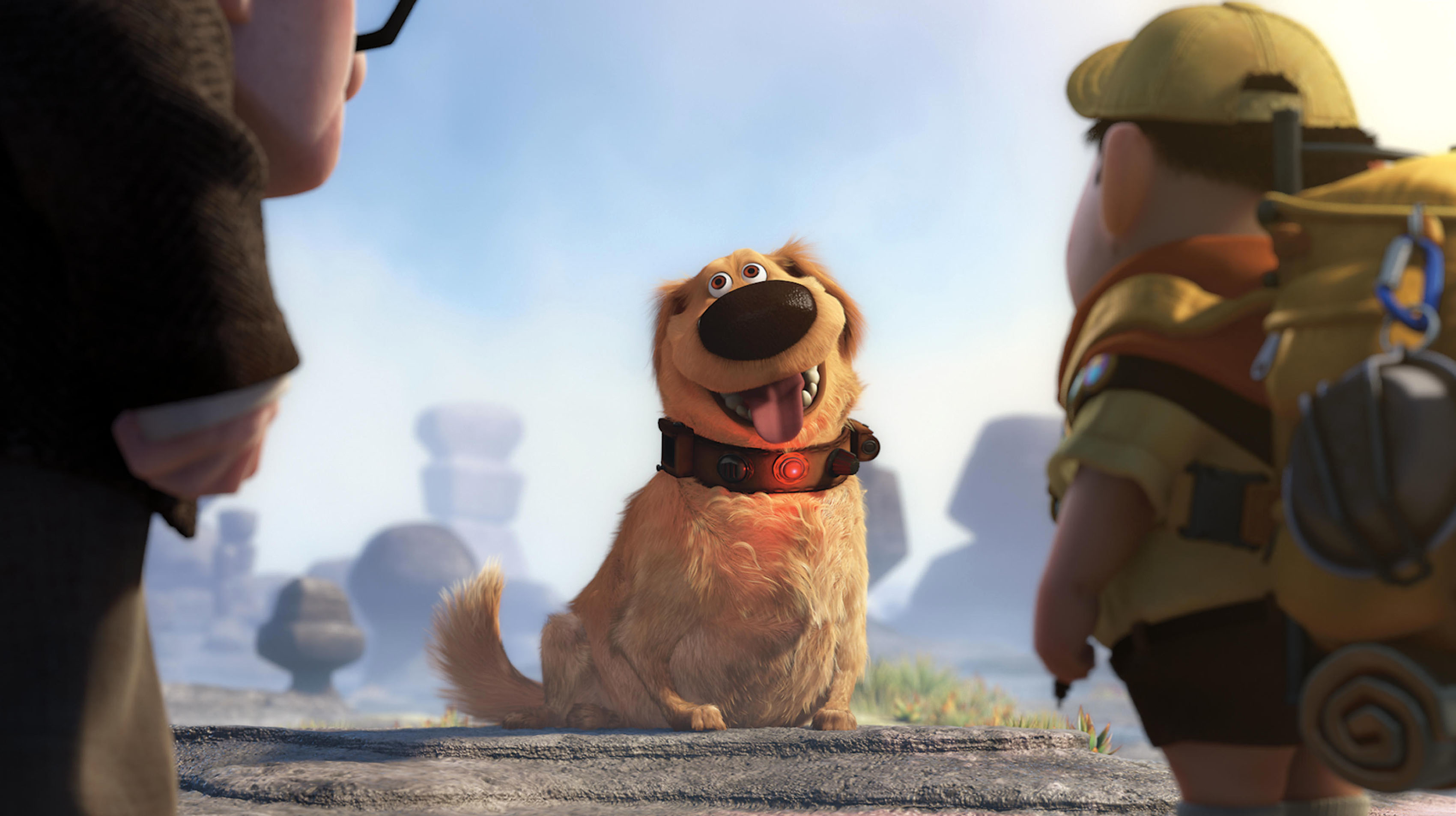 Carl and Russell looking at Dug with a collar featuring a red light in a scene from "Up"