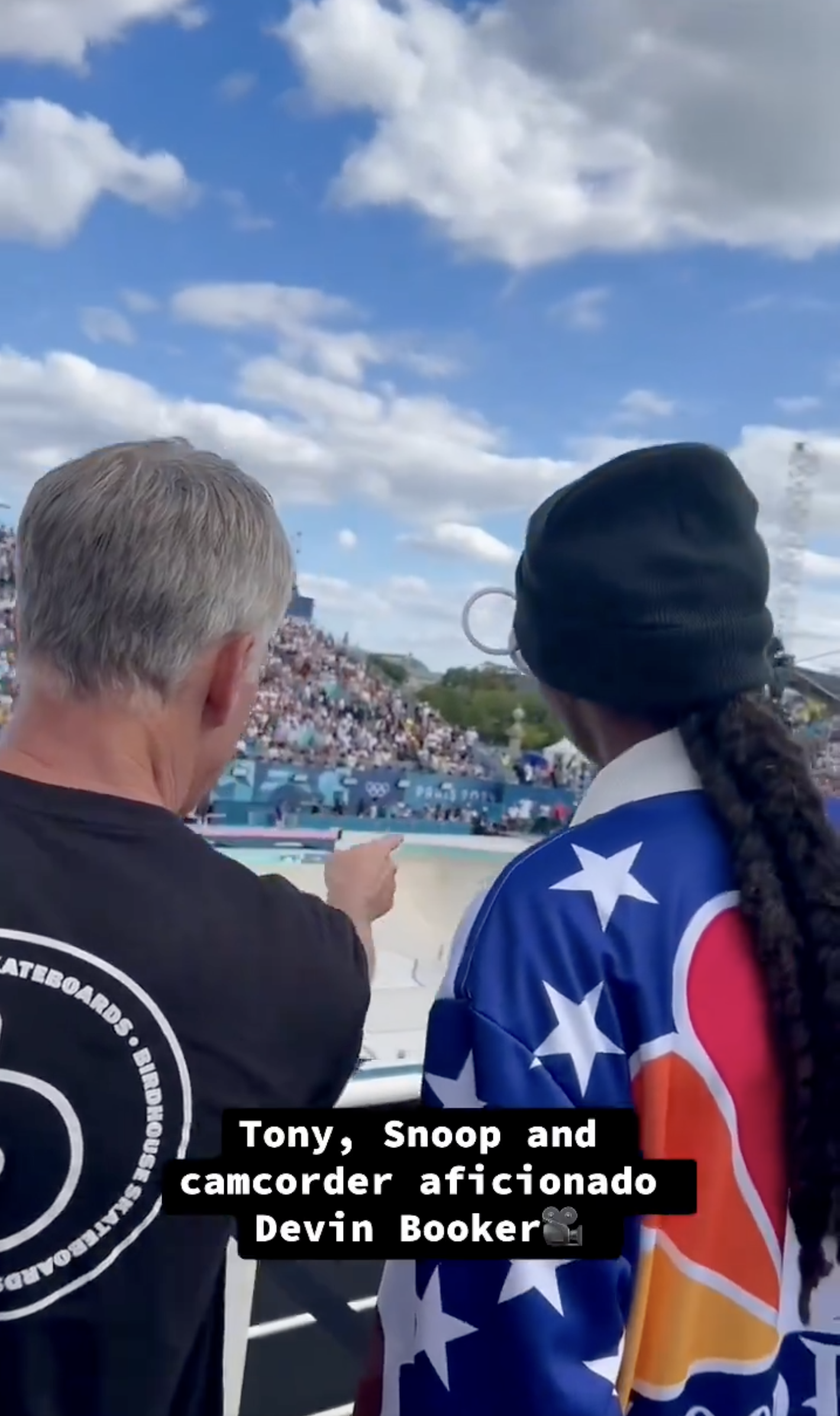Tony Hawk, Snoop Dogg, and Devin Booker stand at a skateboarding event