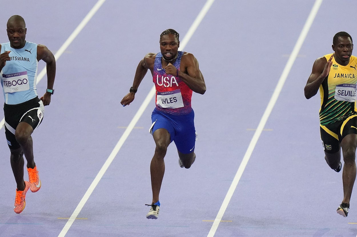 Sprinters Marcell Jacobs, Noah Lyles, and Oblique Seville compete in a track event