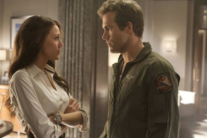 Blake Lively and Ryan Reynolds talking to each other in a scene from &quot;Green Lantern&quot;