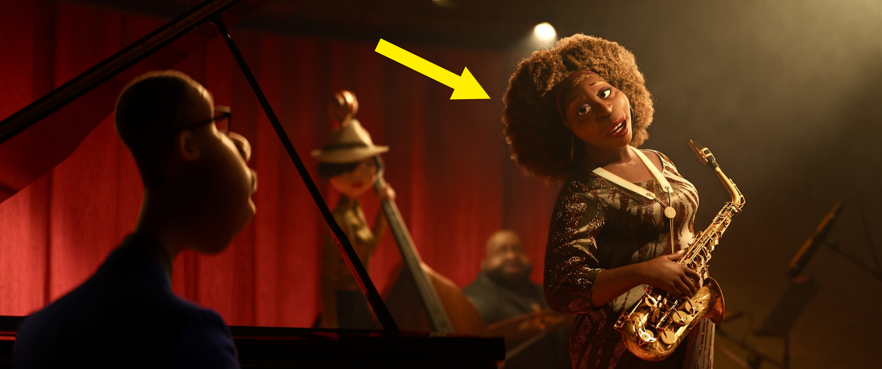 Animated characters from "Soul" performing jazz music on stage; one plays the piano, another plays the bass, and a woman with a saxophone stands in the foreground