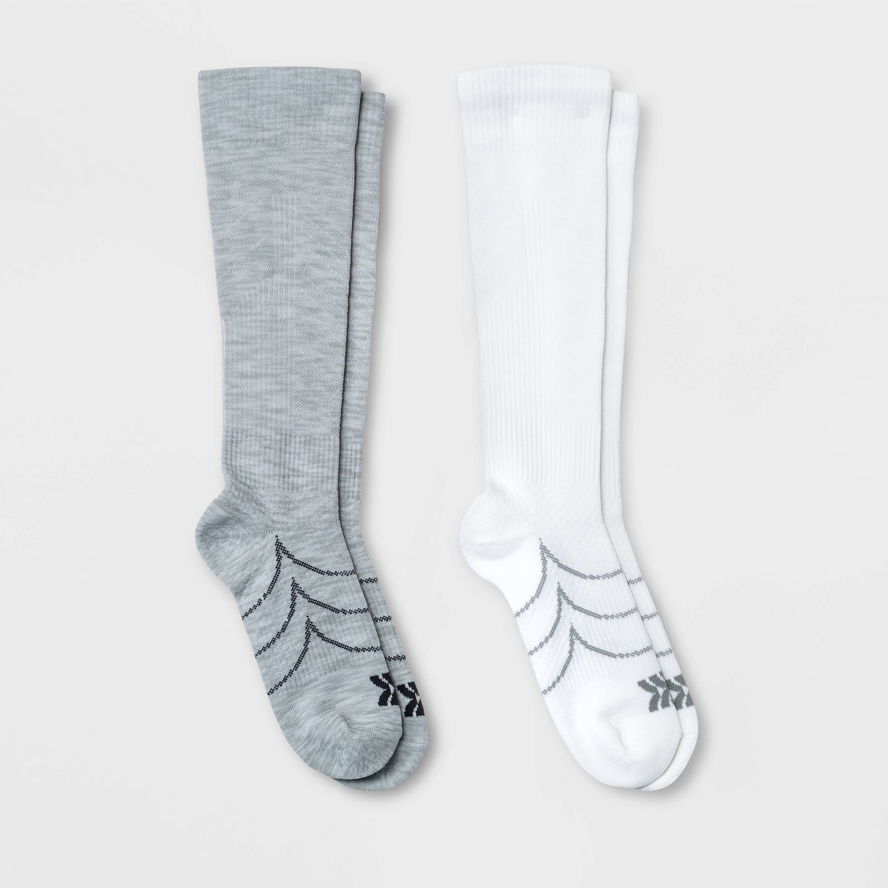 A pair of knee-high socks, one grey and one white