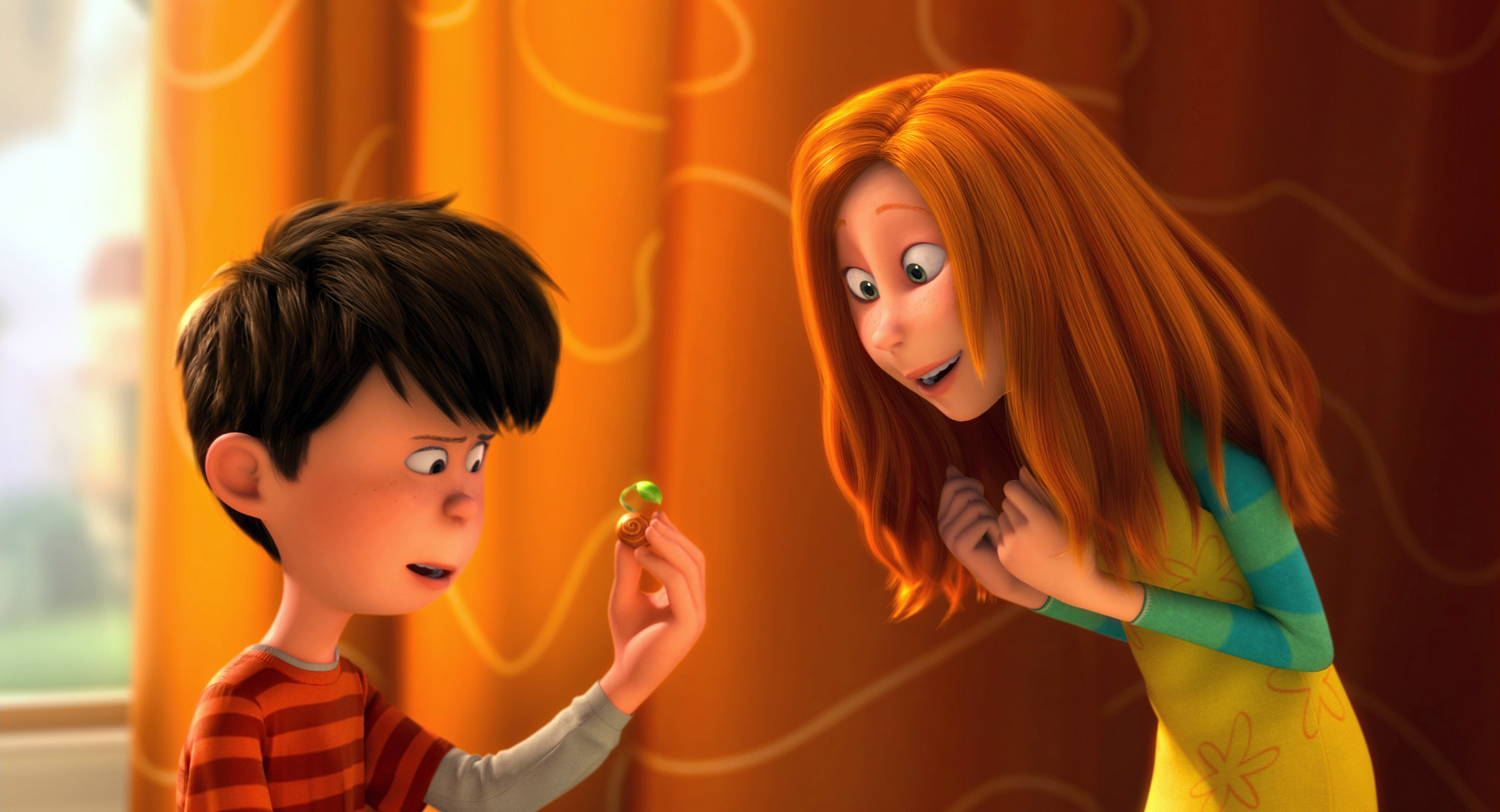 Animated characters Ted and Audrey from &quot;The Lorax&quot; look at a small green object in Ted&#x27;s hand. Ted looks curious, while Audrey appears excited