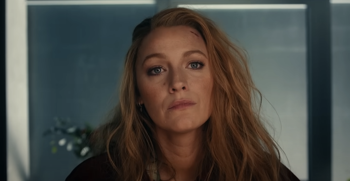 Blake Lively in a close-up scene with disheveled hair and a contemplative expression