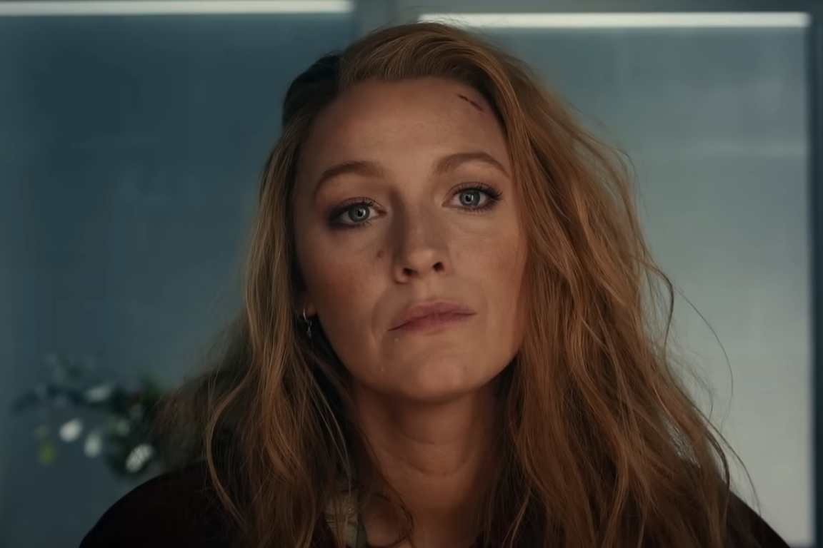 Blake Lively in a close-up scene with disheveled hair and a contemplative expression