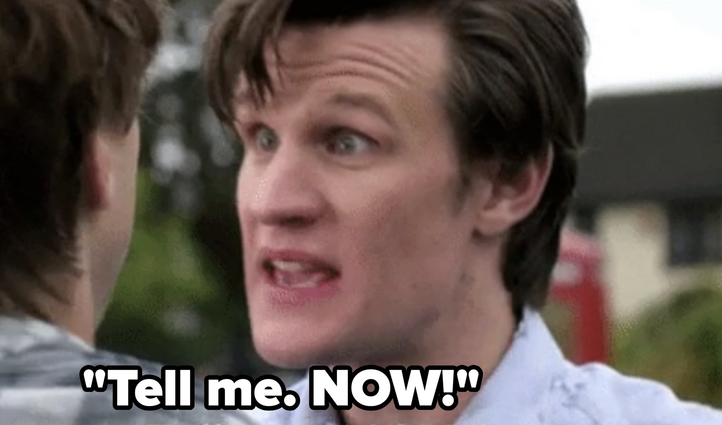 a man saying, "Tell me NOW!"