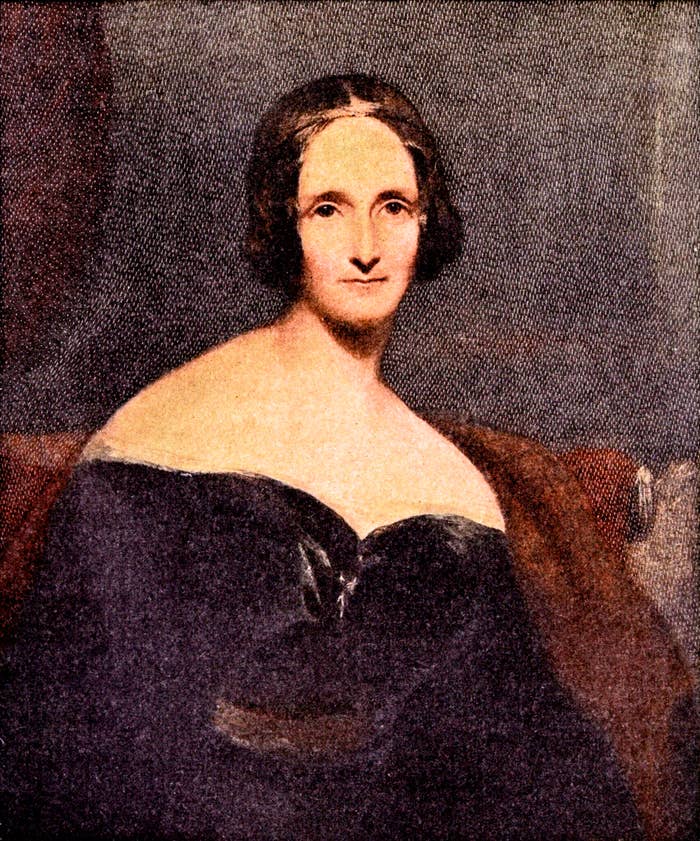 Mary Shelley, known for writing "Frankenstein," is depicted in a classic portrait wearing an off-the-shoulder dress, gazing forward with a neutral expression