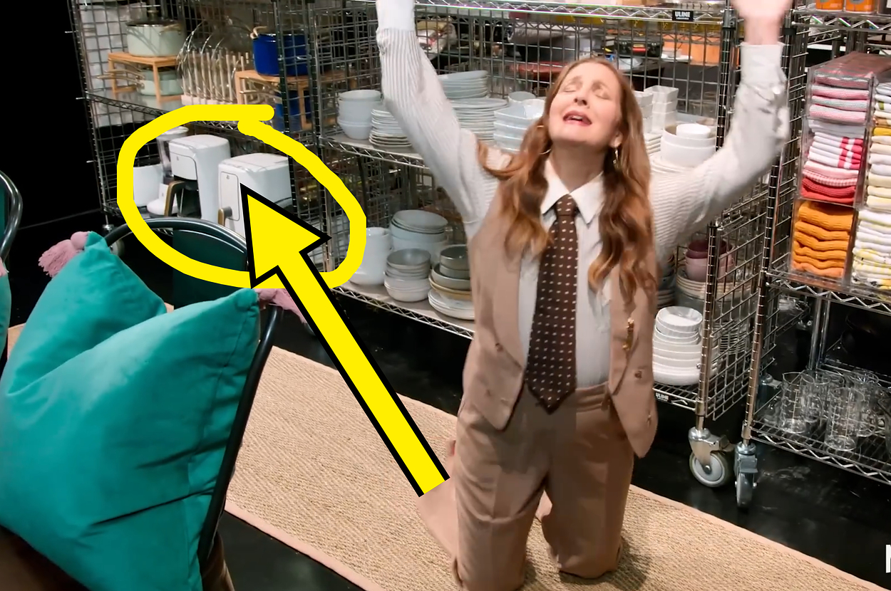 Still from Heartstopper of teenagers making a mess setting up from with the caption "judging my mess" pointing to a boy making a concerned face