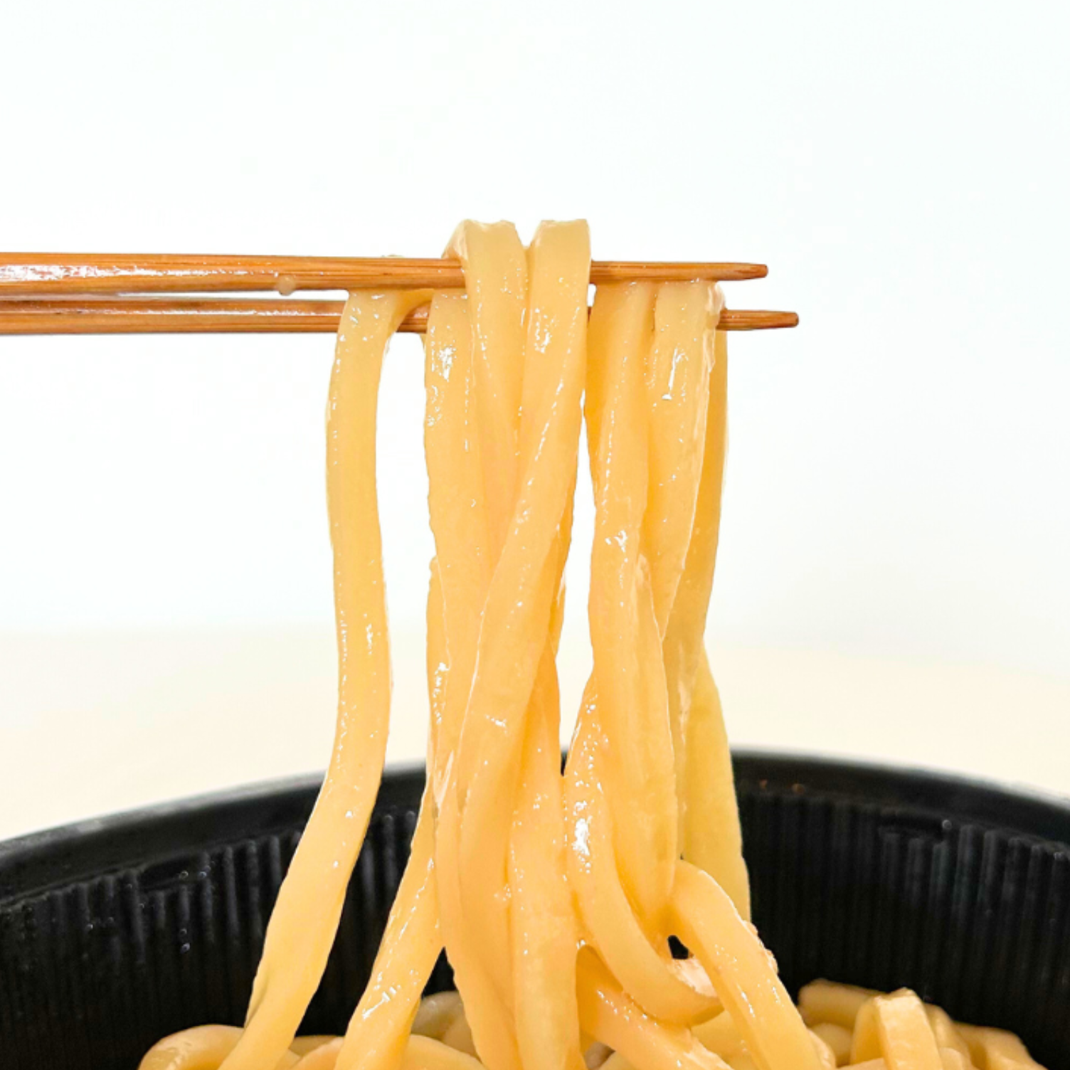 セブンのおすすめフード「7プレミアム 豚肉ねぎうどん」