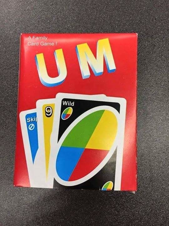 Box for a game resembling Uno, labeled "UM," with images of three cards: a Skip card, a Nine card, and a Wild card