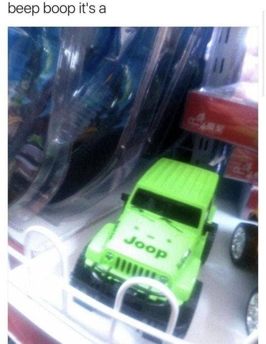 A toy Jeep displayed on a store shelf with a caption above that reads, "beep boop it's a."