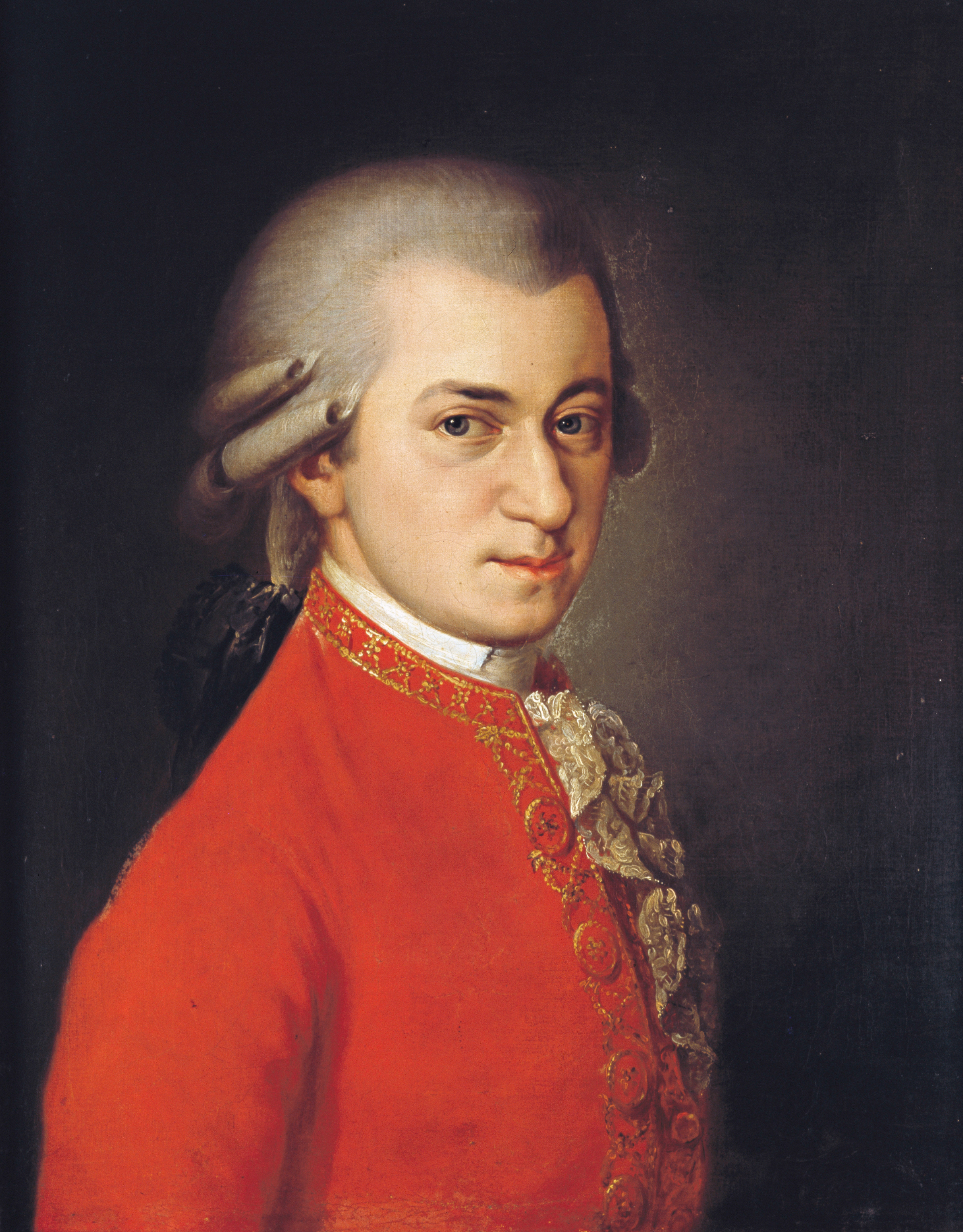 Portrait of Wolfgang Amadeus Mozart wearing an ornate suit with ruffled cravat