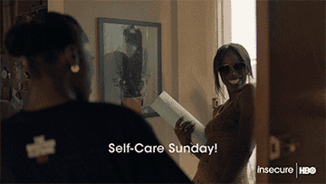 Issa Rae greets Yvonne Orji with a smile as Yvonne holds a yoga mat. The text on the image reads &quot;Self-Care Sunday!&quot; followed by &quot;insecure HBO&quot;