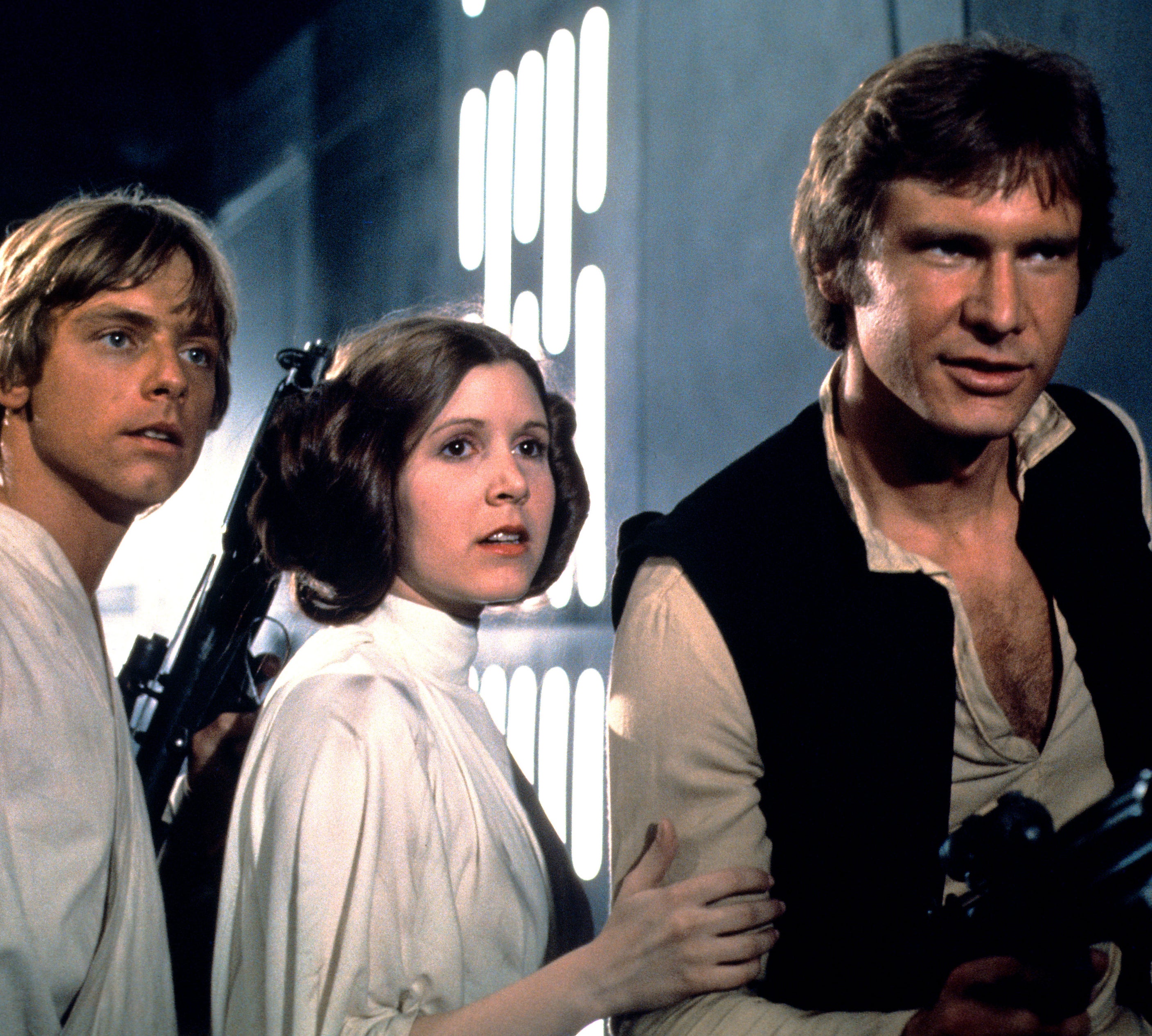 Carrie Fisher and Harrison Ford as Princess Leia and Han Solo in a scene from Star Wars