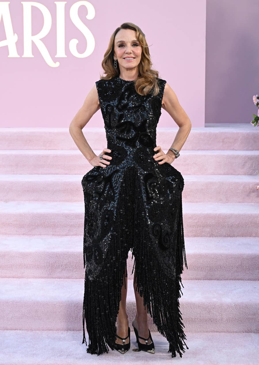 emily in paris purple sequin dress Spotted in New York: Lily Collins carrying the iconic purple sequins FENDI Vintage Baguette from 1997 while promoting the upcoming season of Emily in Paris. A timeless statement, reimagined. Discover FENDI on