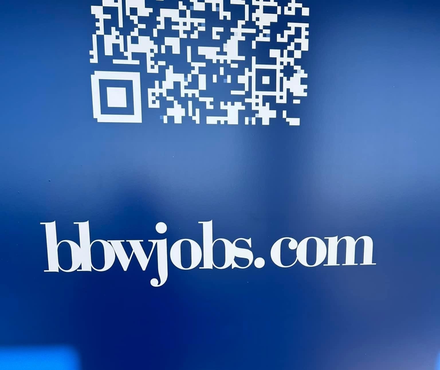 Image of a blue background with a QR code and the text "bbwjobs.com" but the letters are so close together that it looks like "blowjobs.com"