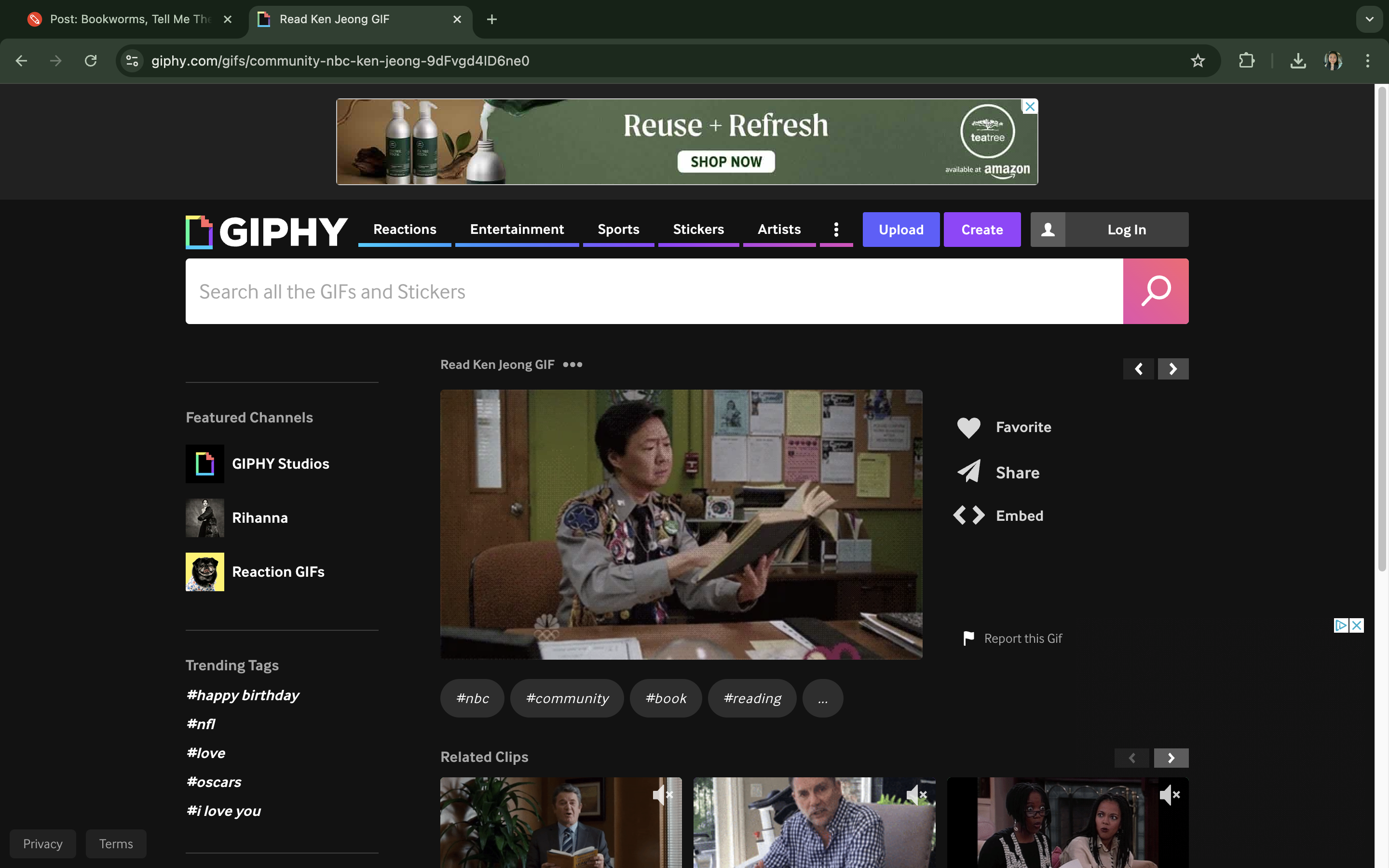 GIPHY website showing a GIF of actor Ken Jeong looking at a book. The page allows users to search for GIFs and includes related GIFs below