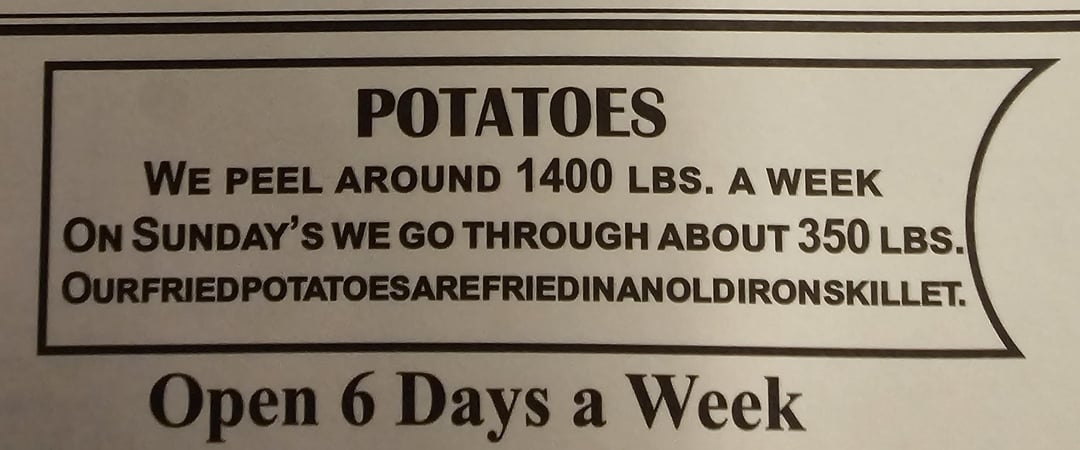 Restaurant sign for fried potatoes where the last sentence is written with no spaces