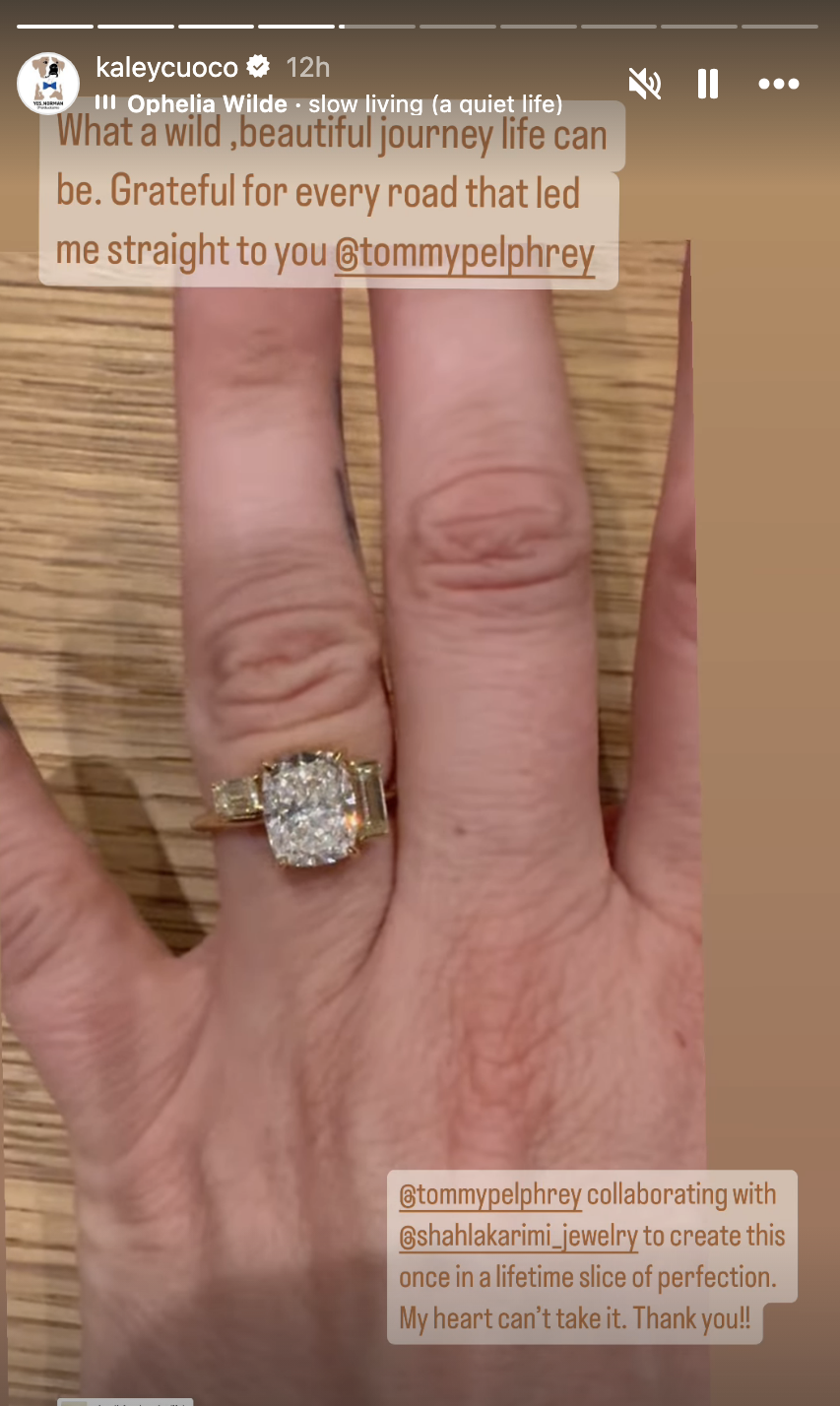 Close-up of Kaley Cuoco's hand showing an engagement ring