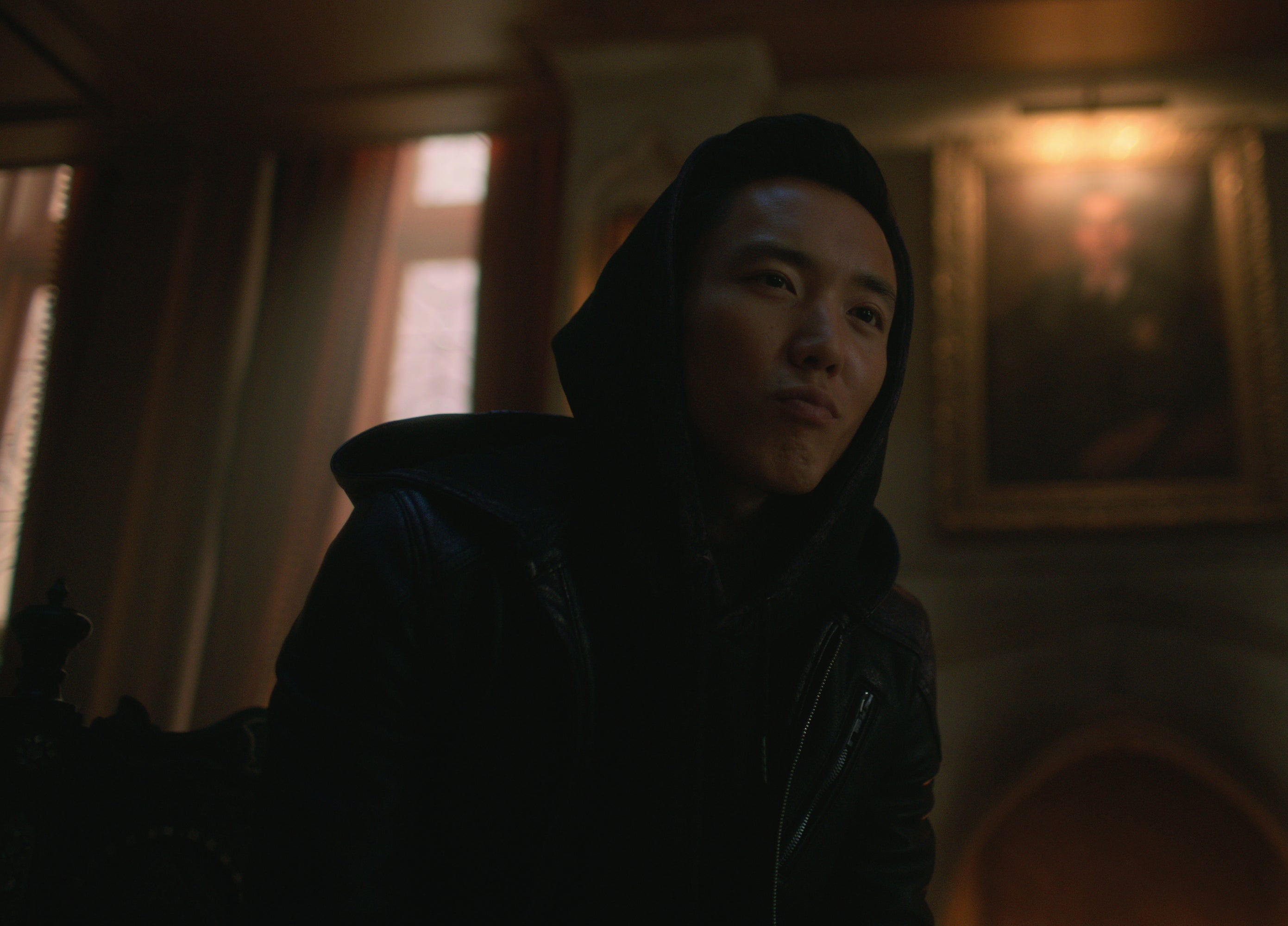 Justin H. Min in a hooded outfit in a scene from "The Umbrella Academy"