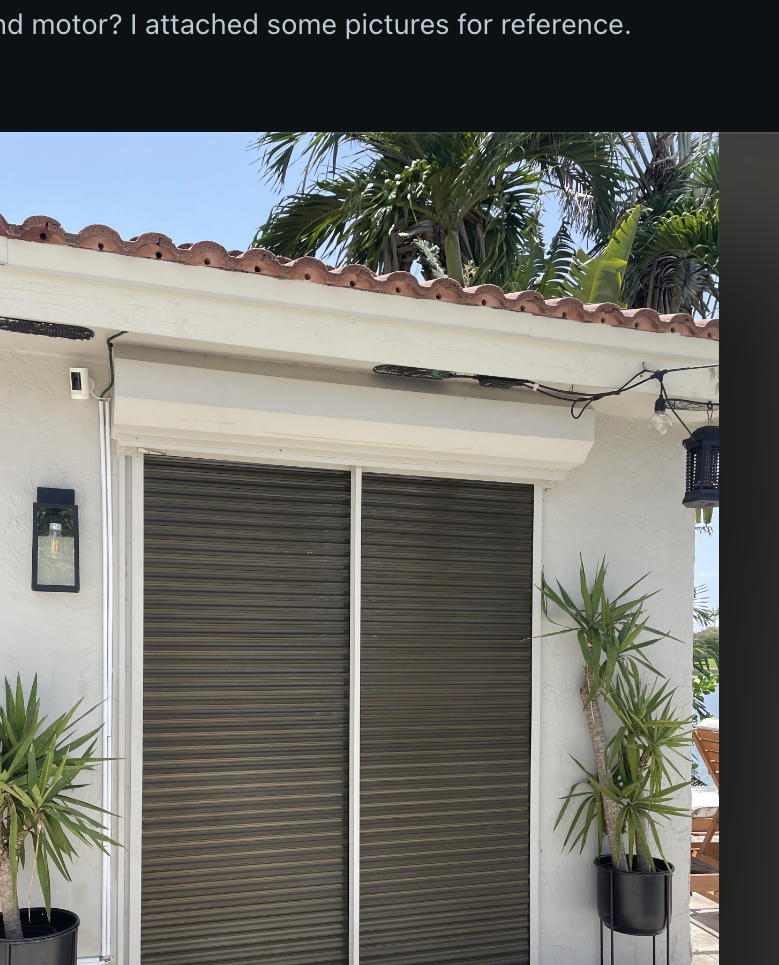 Reddit post discussing the replacement of an old shutter with a new hurricane-compliant shutter, featuring a photo of a house with the new shutter installed