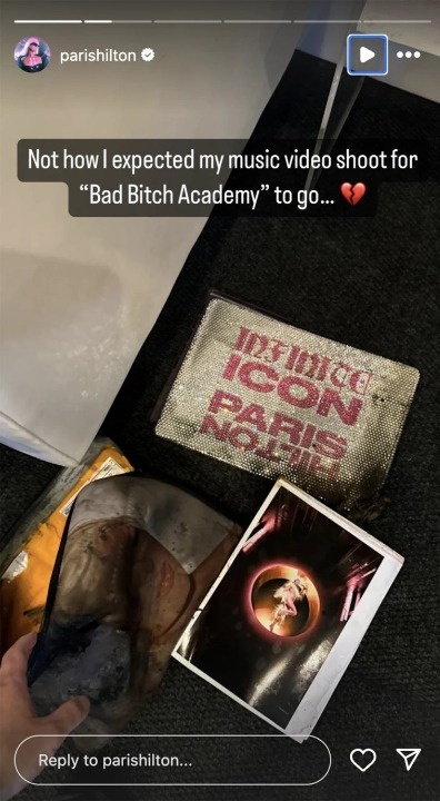 Paris Hilton shared an Instagram story showing a burnt photograph and damaged items with the caption, "Not how I expected my music video shoot for 'Bad Bitch Academy' to go…"