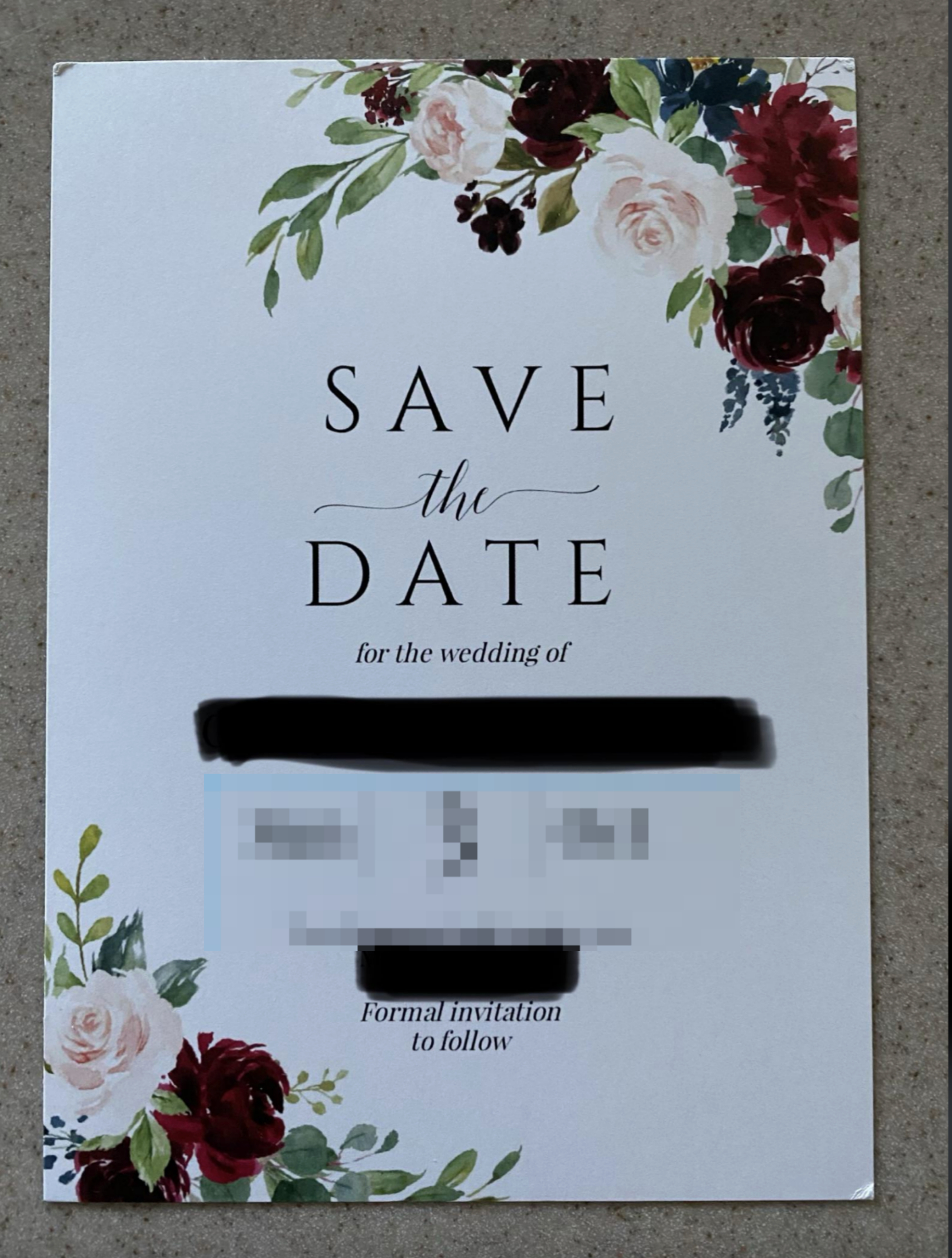 Wedding &quot;Save the Date&quot; card with floral designs at the top and bottom