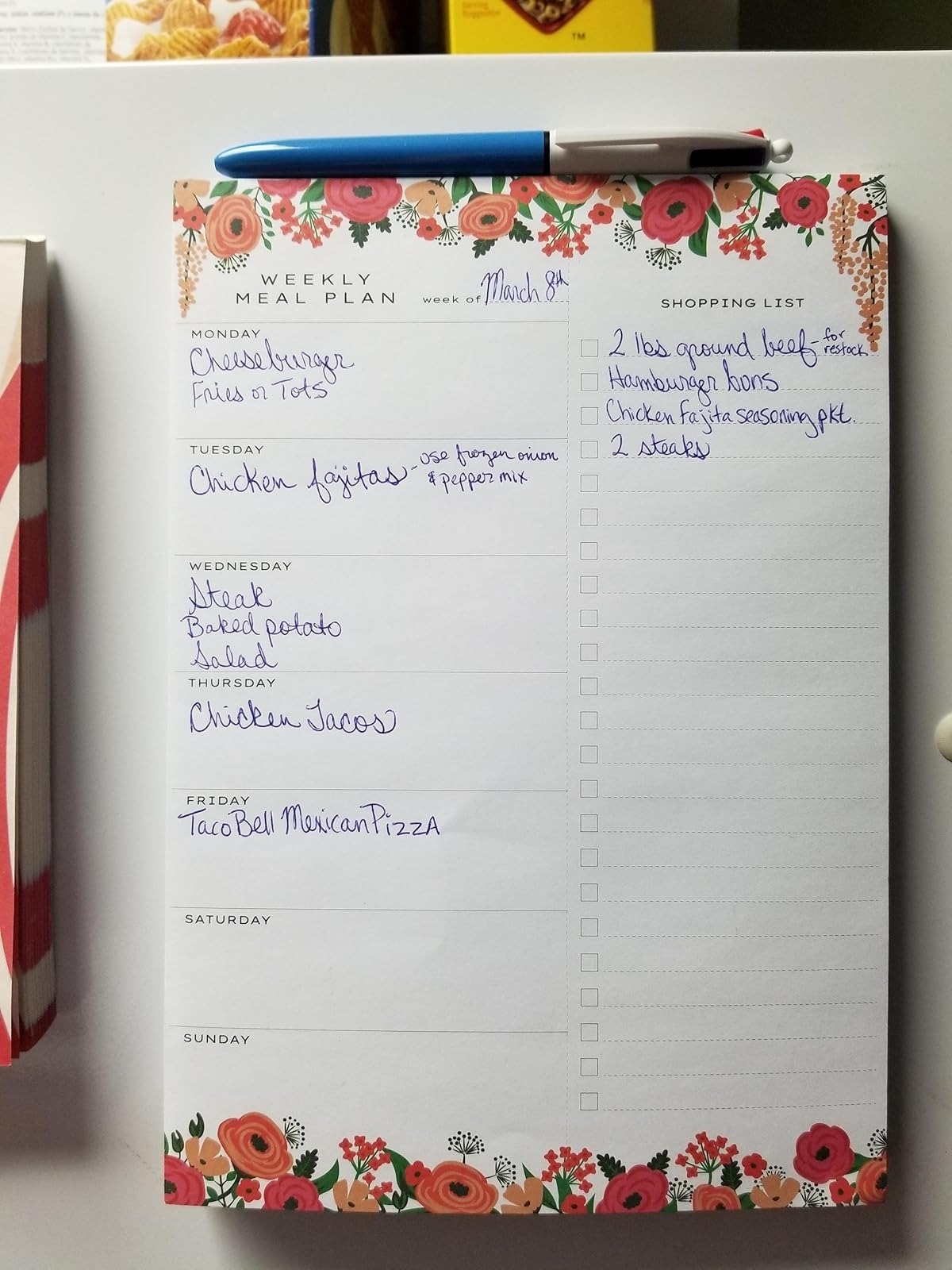 Weekly meal plan and shopping list, March 8th. Meals: cheeseburger &amp;amp; fries, chicken fajitas, steak &amp;amp; baked potato, chicken tacos, Taco Bell pizza. Shopping list: ground beef, hamburger buns, chicken, fajita seasoning, steak