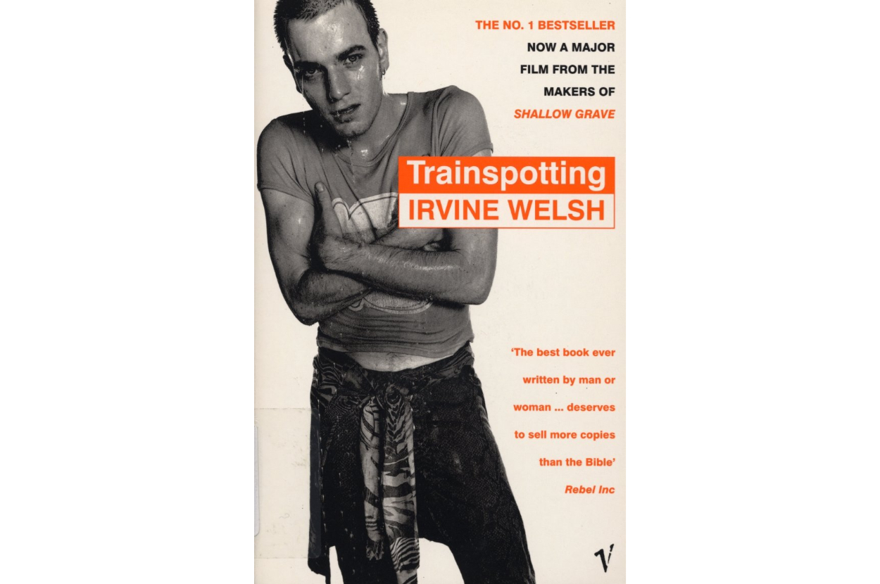 Cover of the book &quot;Trainspotting&quot; by Irvine Welsh featuring a man with a pensive expression, highlighted text, and review excerpts