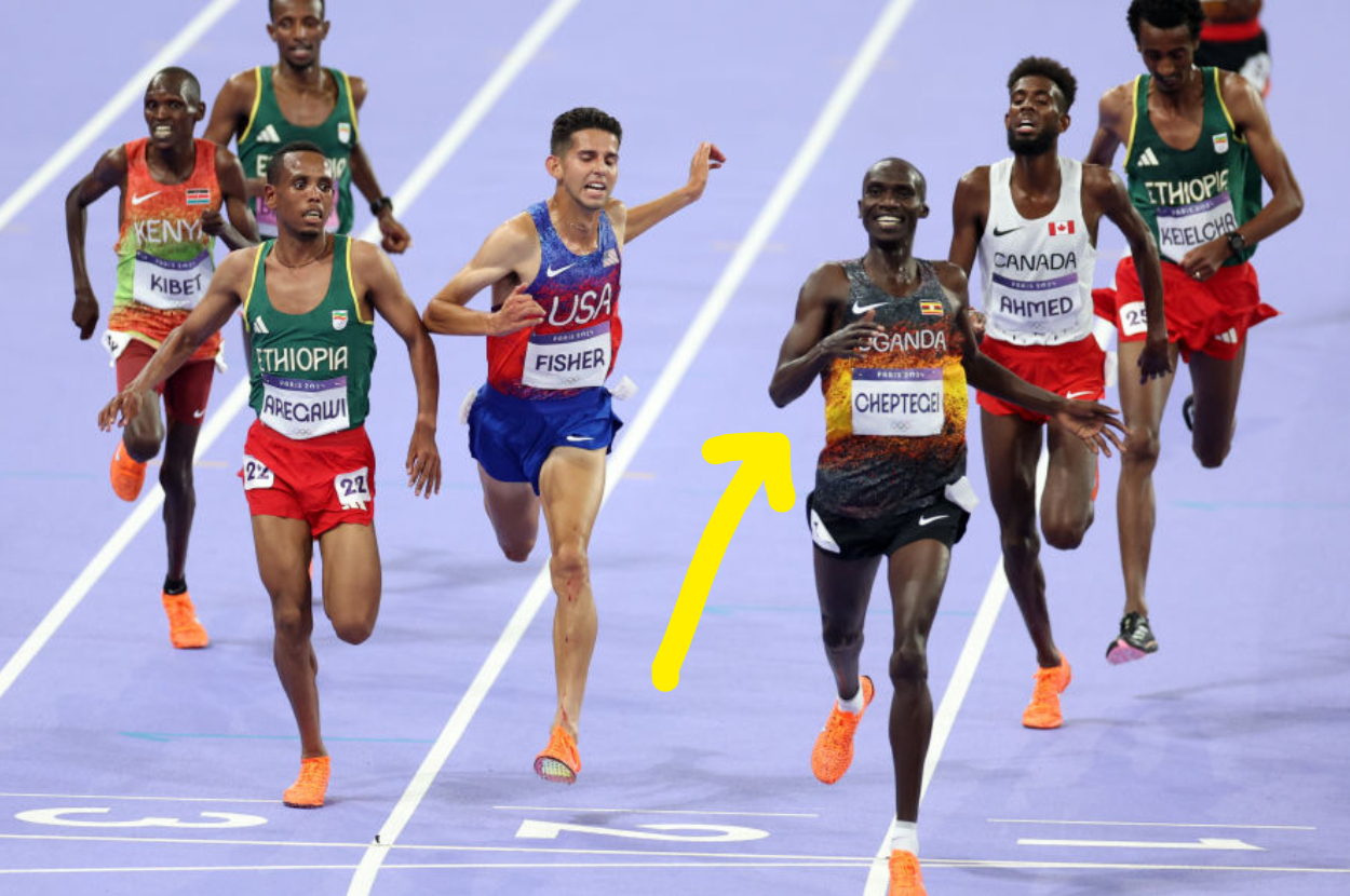 Joshua Cheptegei (Uganda) wins a 5000-meter race against athletes including Grant Fisher (USA), Birhanu Balew (Bahrain), and Mo Ahmed (Canada) on track
