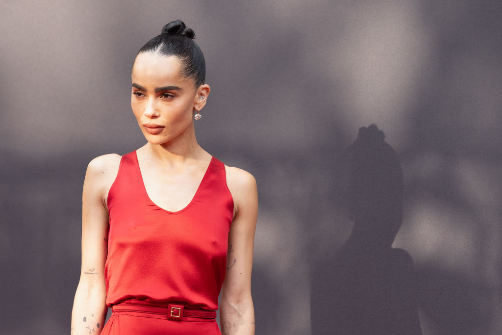 Zoe Kravitz in a sleeveless, fitted gown, on the red carpet