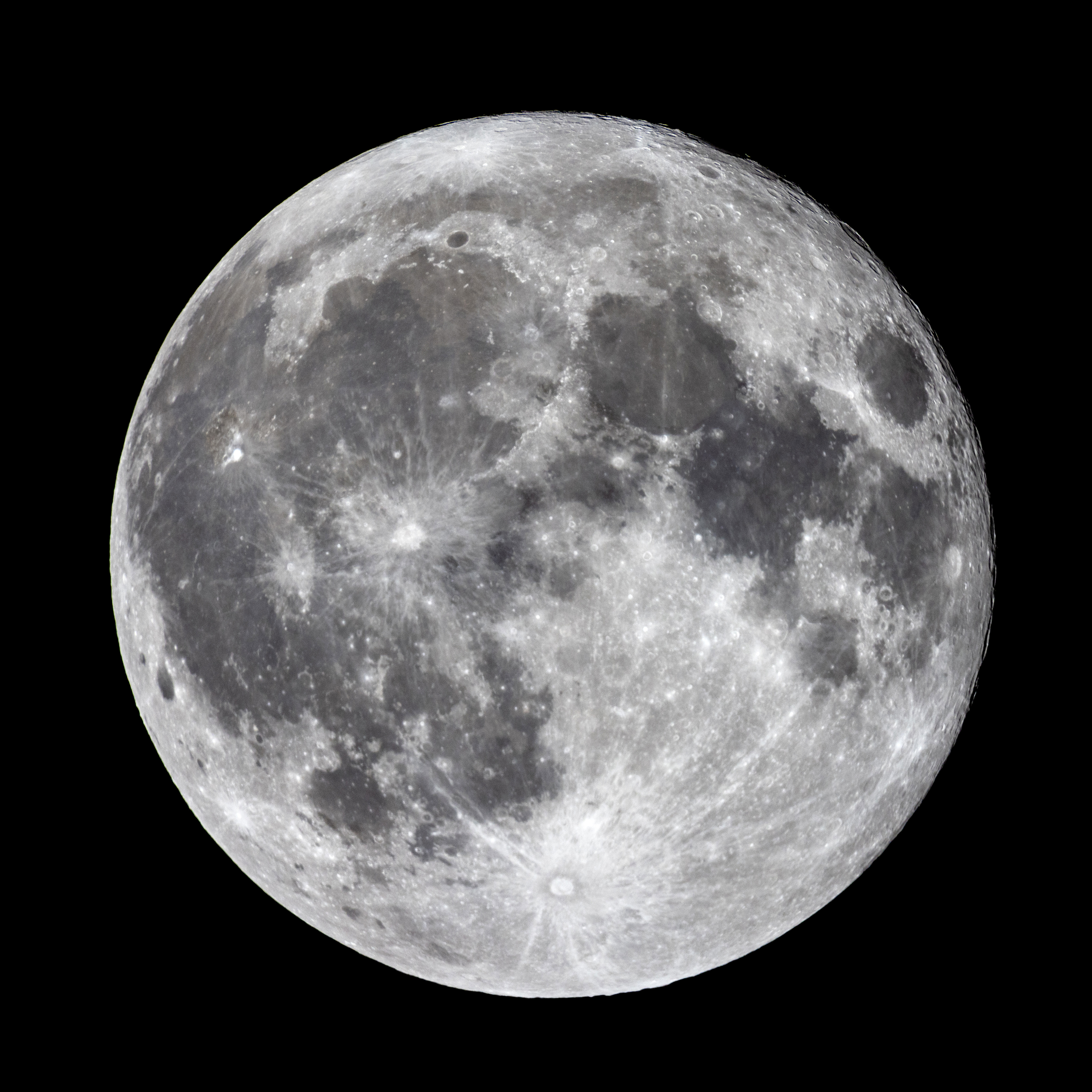 Image of the full moon showing its craters and surface details against a black background