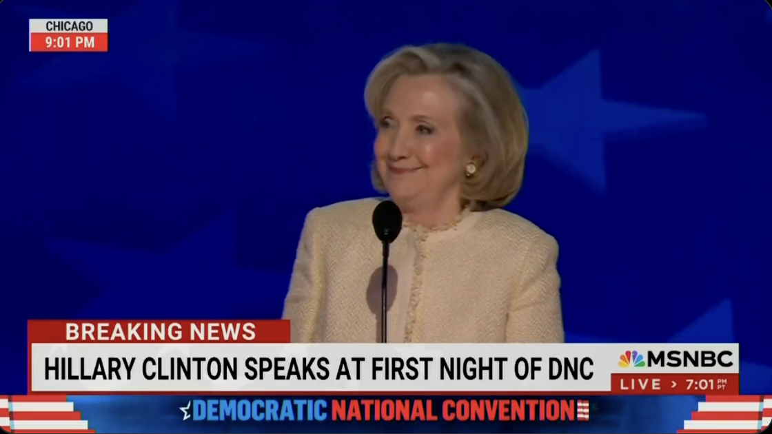 Hillary Clinton speaks at the first night of the Democratic National Convention. MSNBC banner reads: &quot;Breaking News: Hillary Clinton speaks at first night of DNC.&quot;