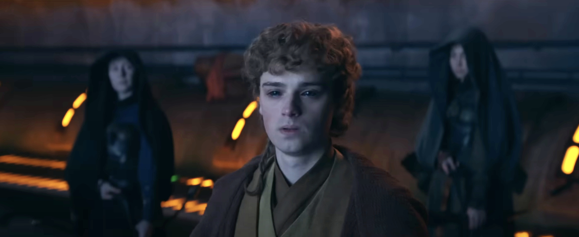 Liam Cunningham, Daisy Edgar-Jones, and Joel Edgerton dressed as characters from their movie in a futuristic setting
