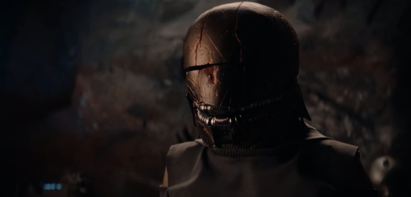 The Stranger wearing a helmet and dark armor
