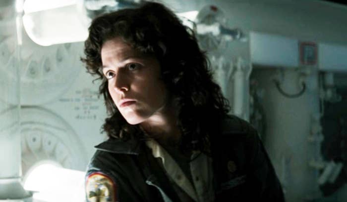 Sigourney Weaver as Ellen Ripley in a scene from the movie "Alien," dressed in rugged space attire inside a futuristic spaceship