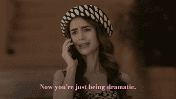 Lily Collins wearing a patterned beret and dress, speaking on the phone with text overlay: "Now you're just being dramatic."