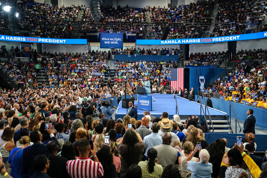 Kamala Harris speaks at an indoor campaign rally