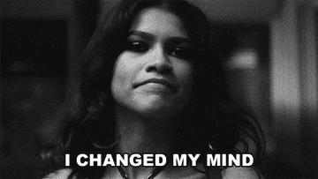 Close-up of Zendaya smiling slightly with text overlay: "I CHANGED MY MIND."