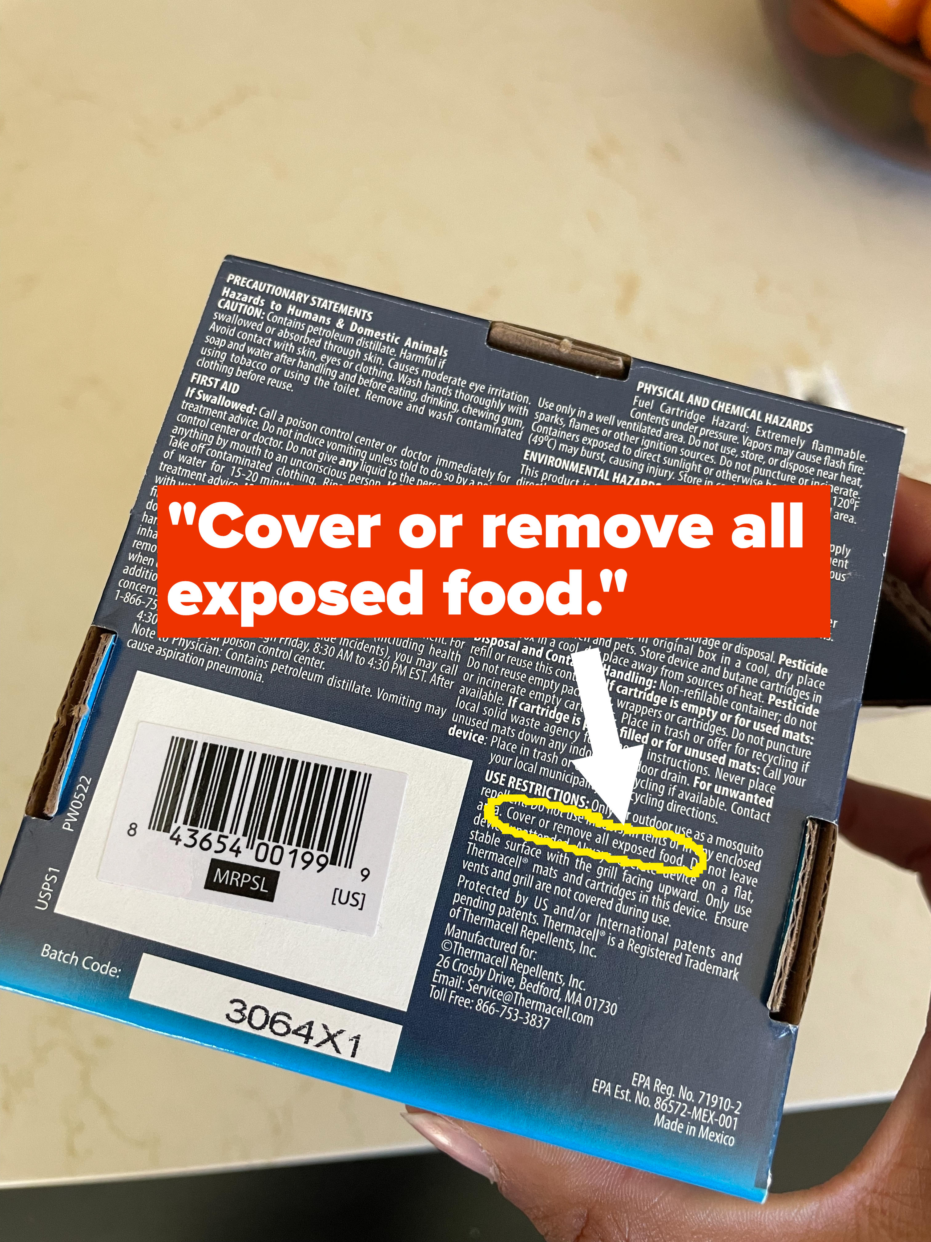 Bottom of a Thermacell product packaging with a highlighted message reading "Cover or remove all exposed food"