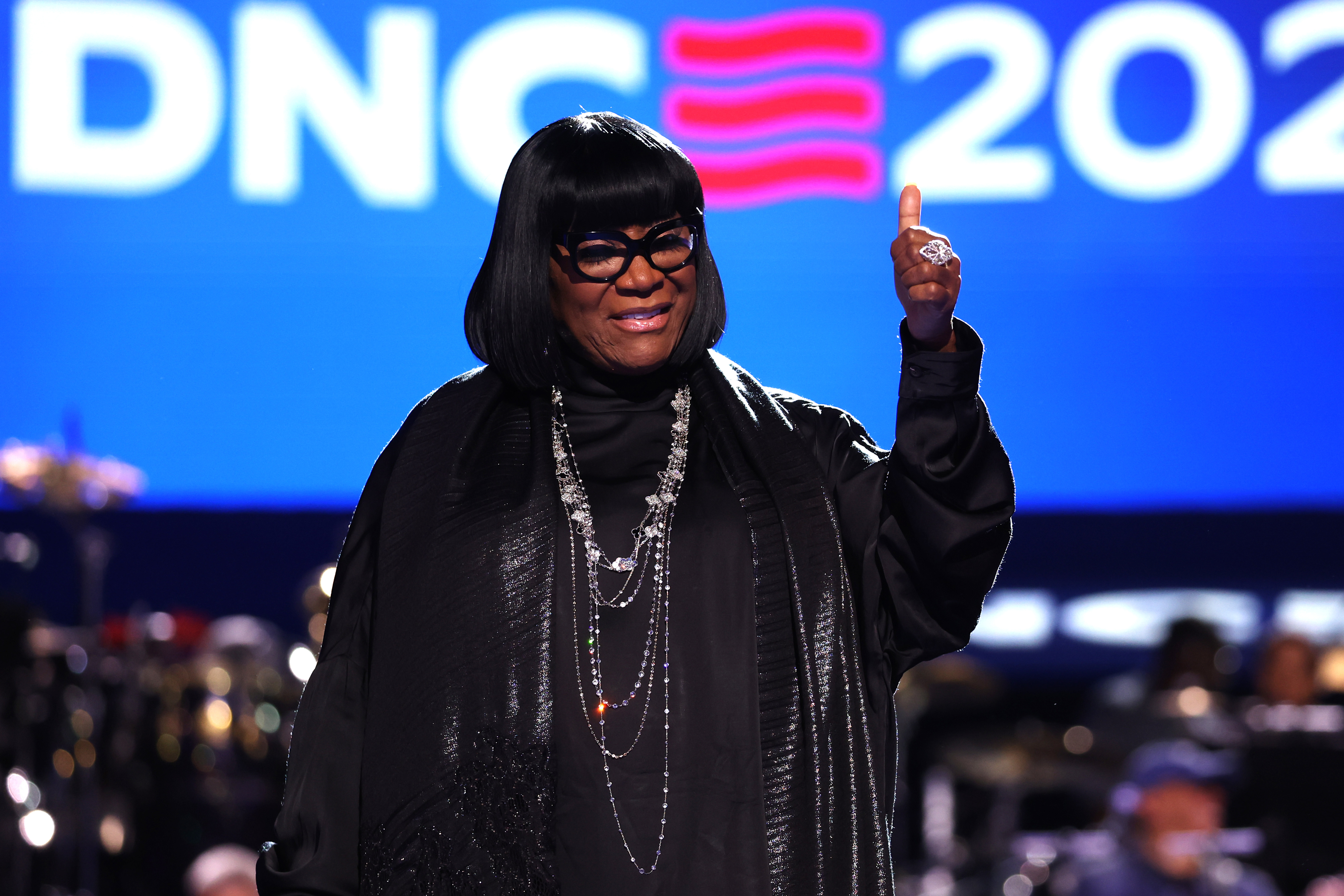 Patti LaBelle gives a thumbs-up while wearing a black outfit and glasses at the DNC 2020 event