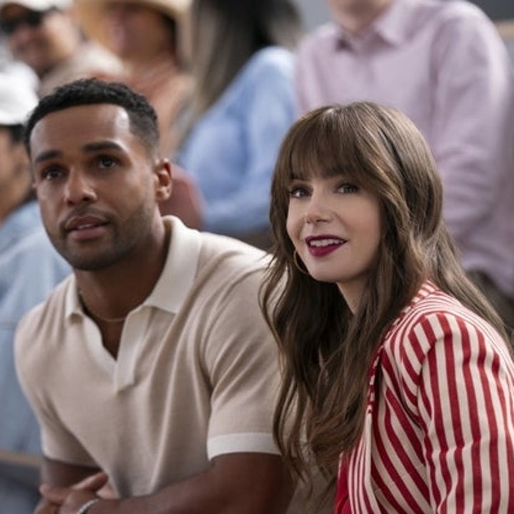Lucien Laviscount and Lily Collins sit together with a crowd in the background in "Emily in Paris" Season 4