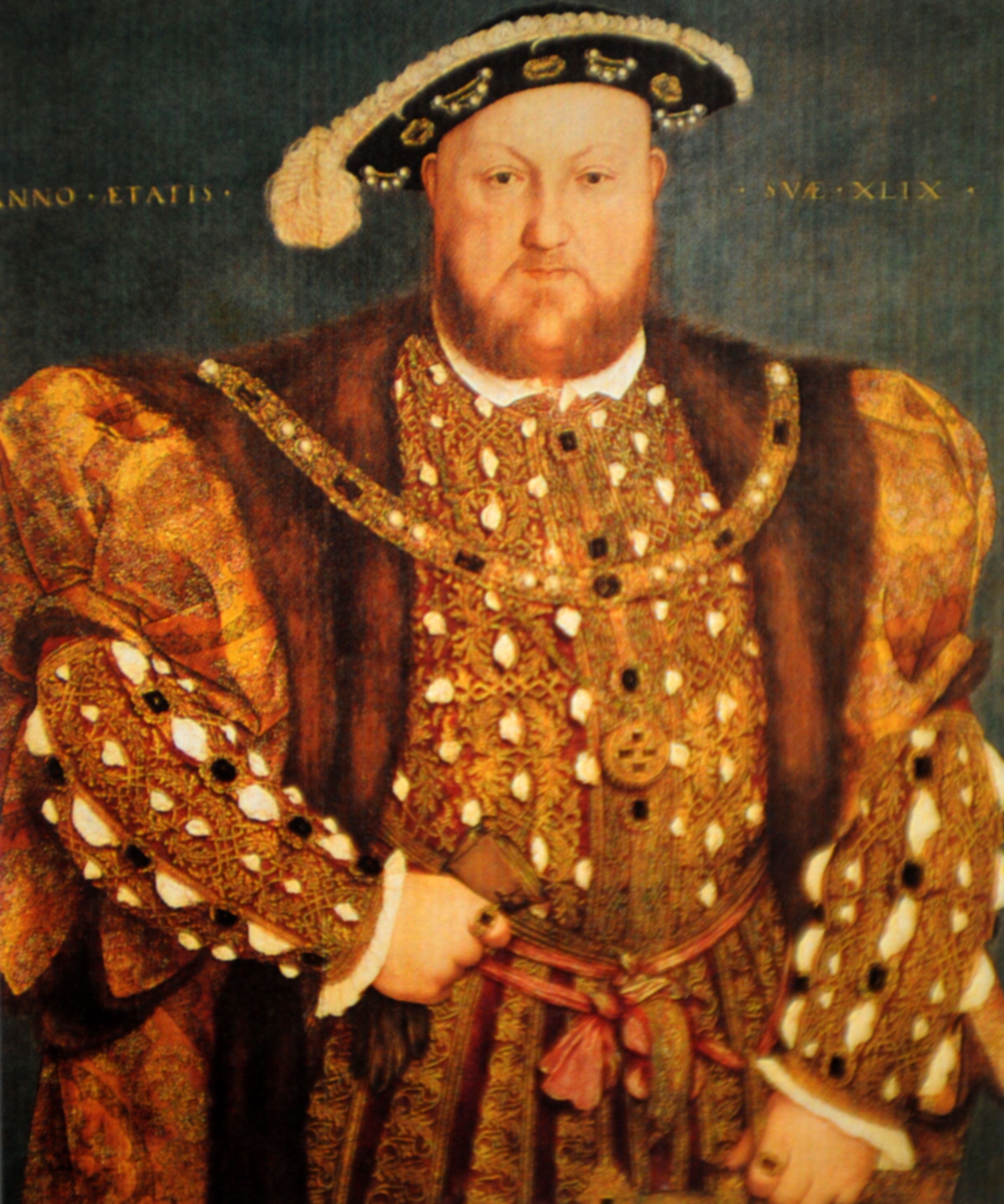 Portrait of Henry VIII, wearing elaborately decorated 16th-century clothing with a fur-trimmed cloak and a hat