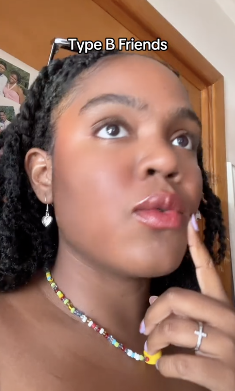 Dionna with braided hair and beaded necklace, looking thoughtful with hand on chin. Text reads "Type B Friends."