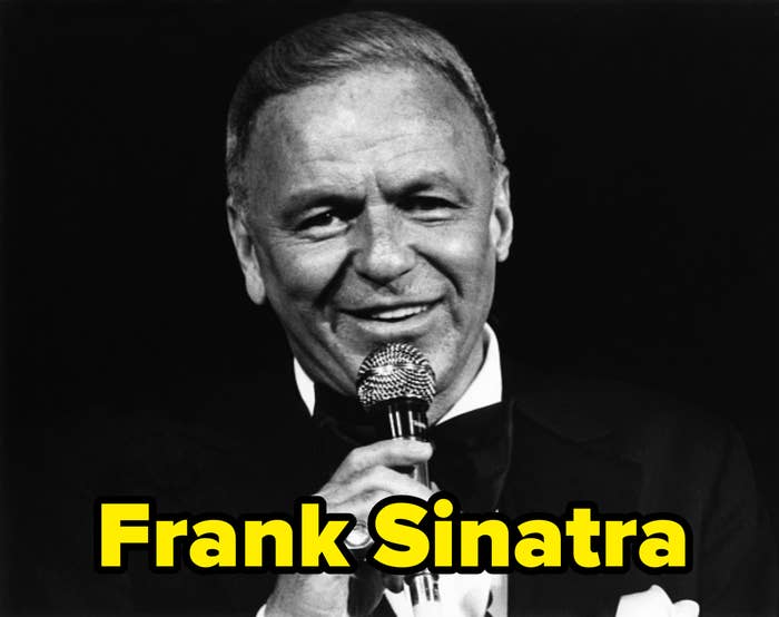 Frank Sinatra holding a microphone, wearing a tuxedo with a bow tie, and smiling while performing