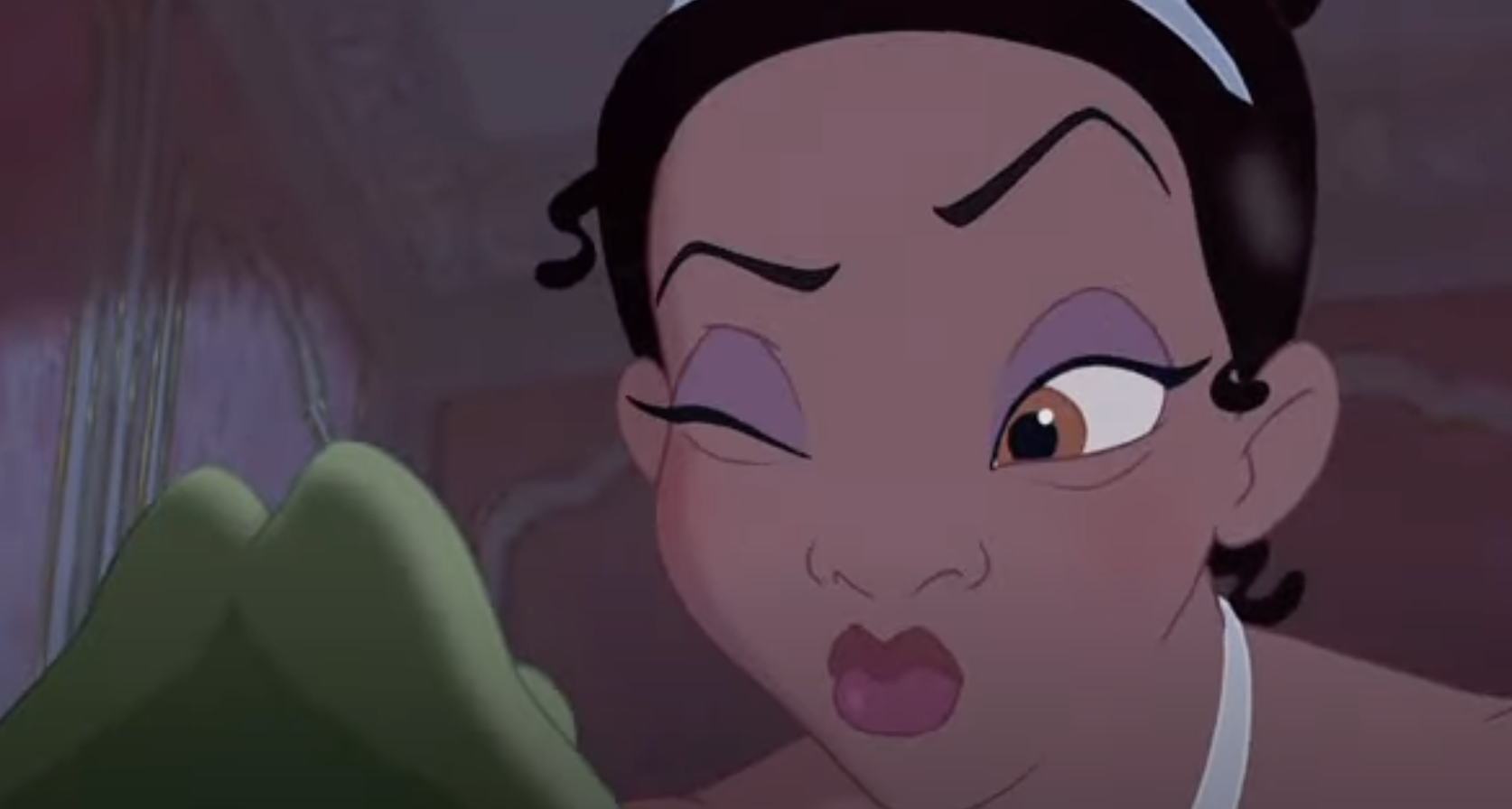 Tiana from The Princess and the Frog hesitantly kisses a frog, her eyes half-closed and lips puckered