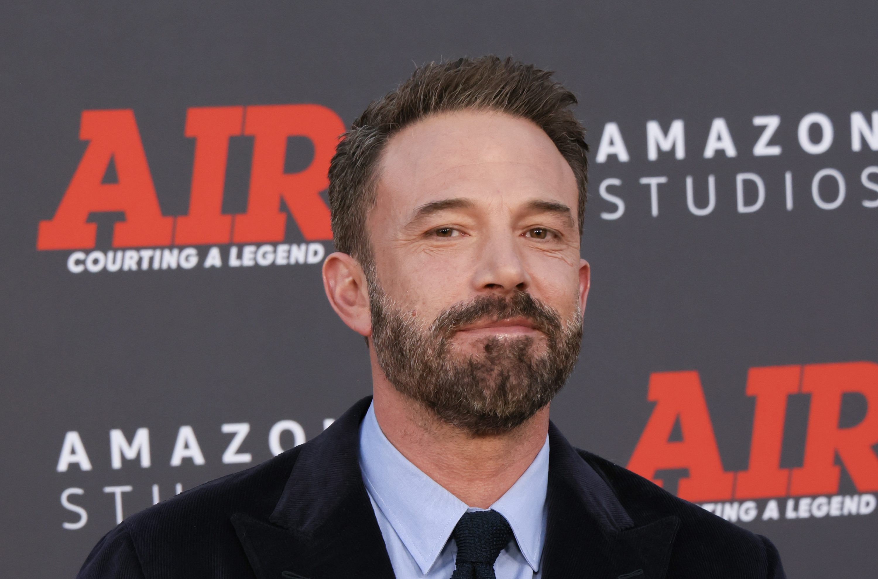 Ben Affleck at the premiere of "AIR" at Amazon Studios. He is wearing a formal suit and tie