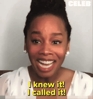 Anika Noni Rose smiling and saying "I knew it! I called it!" with the word "CELEB" in the top right corner