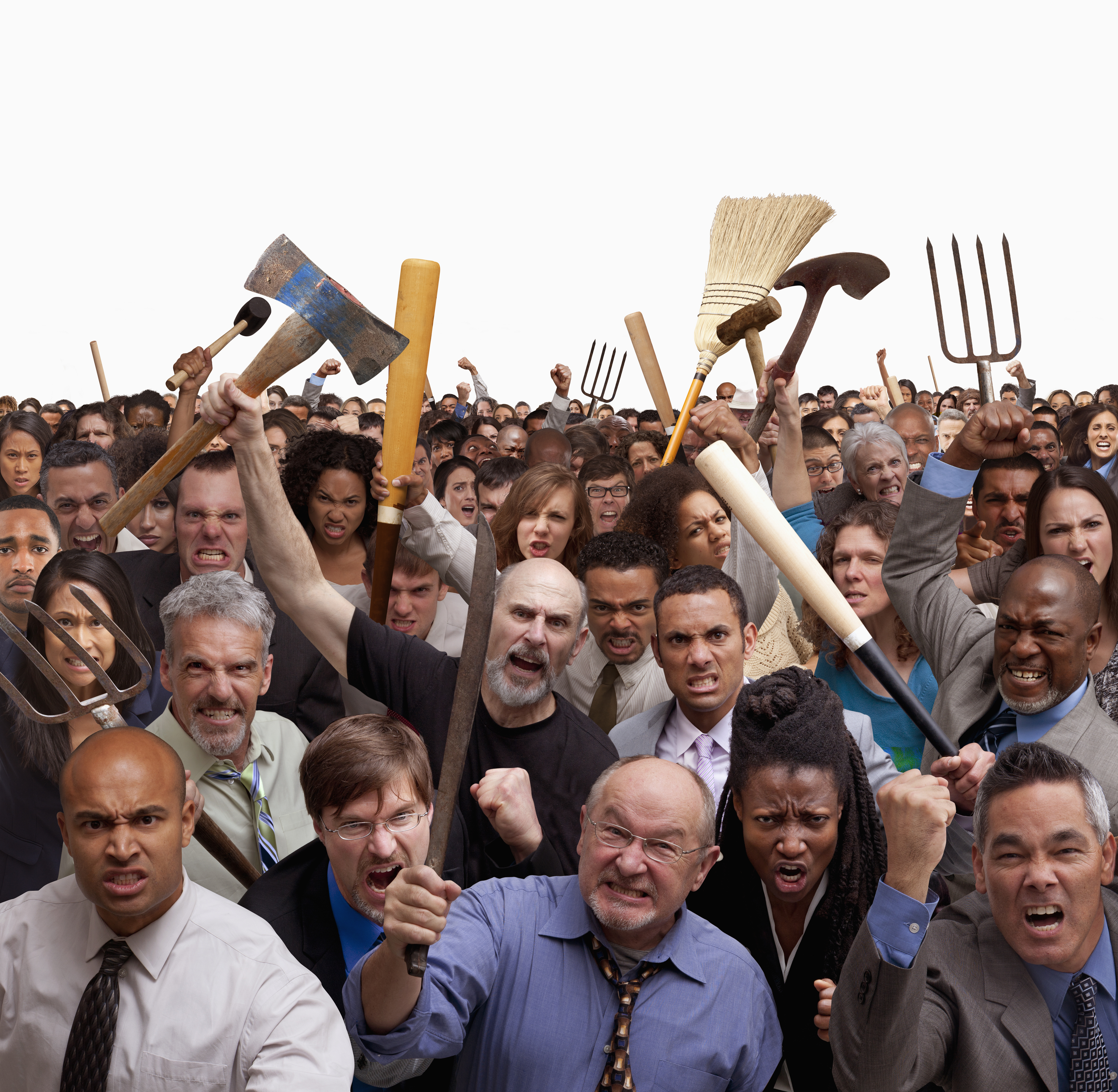 A large group of people holding various objects such as pitchforks, brooms, and an axe, appear agitated and are raising their fists